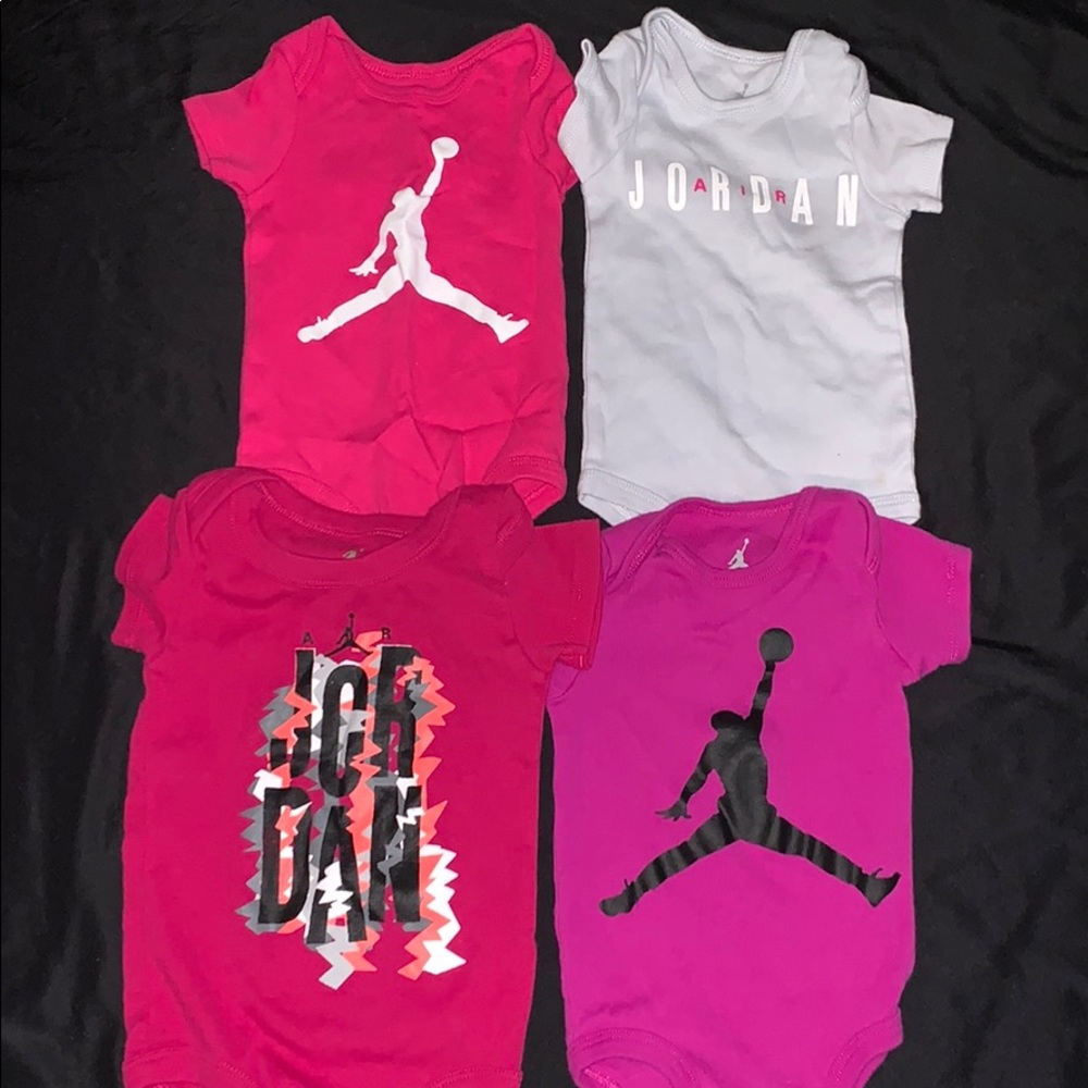 Jordan 0-6 month onesies .